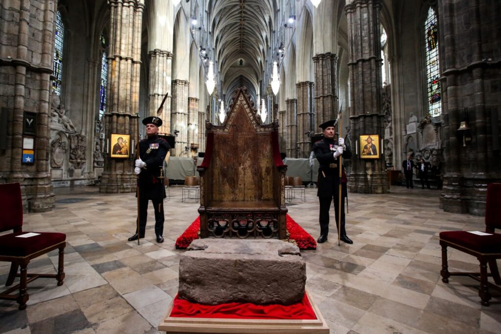King's Bodyguards for Scotland and members of Royal Company of Archers Alex Baillie-Hamilton and Paul Harkness stand guard by the Stone of Destiny at Westminster Abbey during a welcome ceremony, in central London, Britain, on 29th April, 2023.