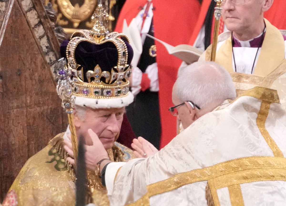 King Charles III receives The St Edward's Crown during his coronation ceremony in Westminster Abbey, London on 6th May, 2023.