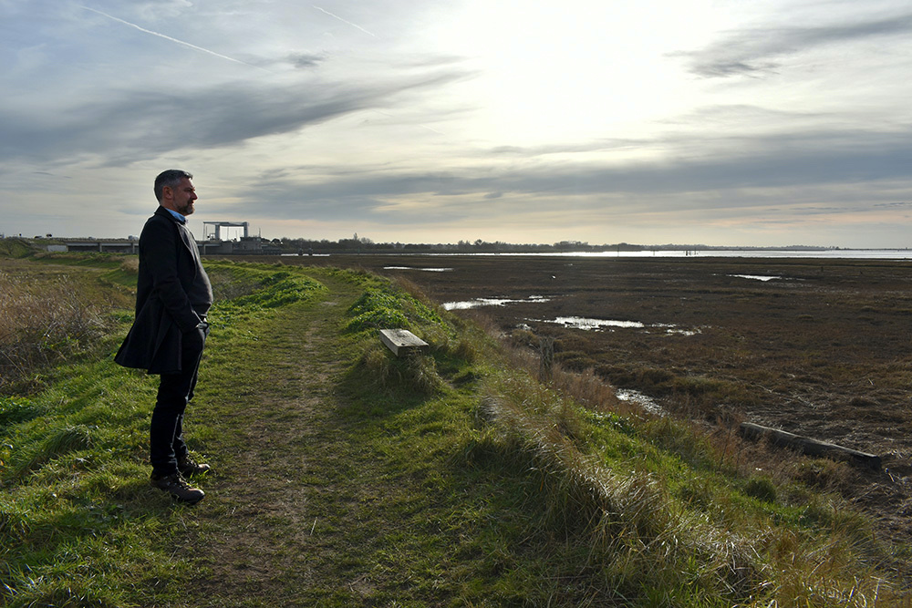 Broads resident and activist Duncan Holmes studies Breydon Water in the floodplain of the River Yare near Great Yarmouth, east England, on 10th February, 2023.