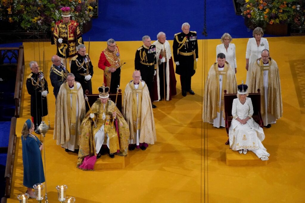 King Charles III wearing the St Edward's Crown and Queen Camilla wearing the Queen Mary's Crown during their coronation ceremony in Westminster Abbey, London, on Saturday 6th May, 2023.