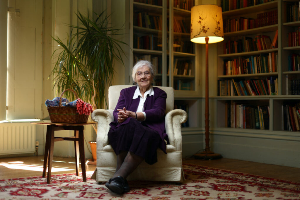 Pamela Tawse, 88, poses for a photograph in the library room of the Hawkwood Centre for Future Thinking in Stroud, Britain, on 20th April, 2023.
