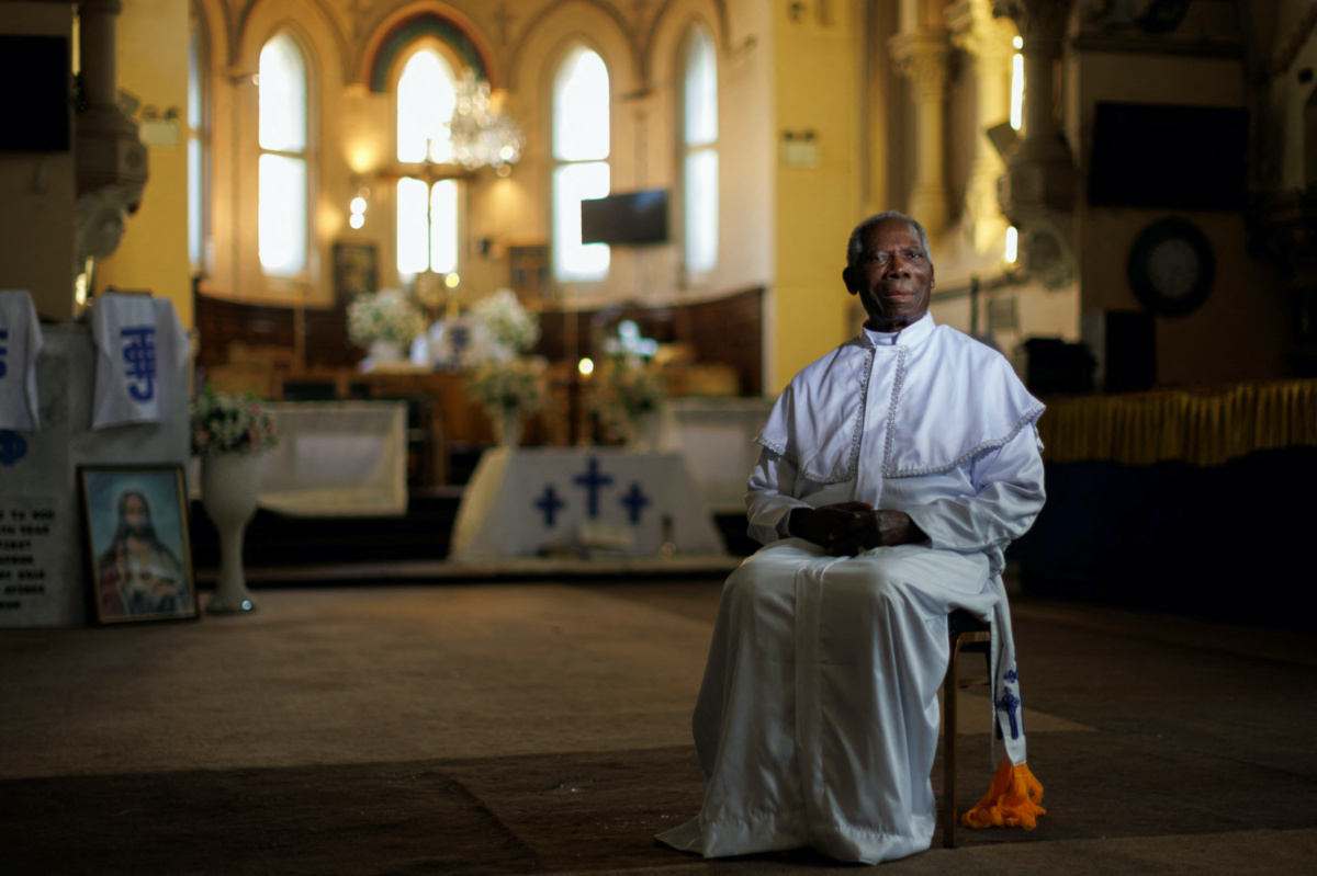 Reverend Milton Job, 90, poses for a photograph in the Celestial Church of Christ in South-East London, Britain, on 19th April, 2023