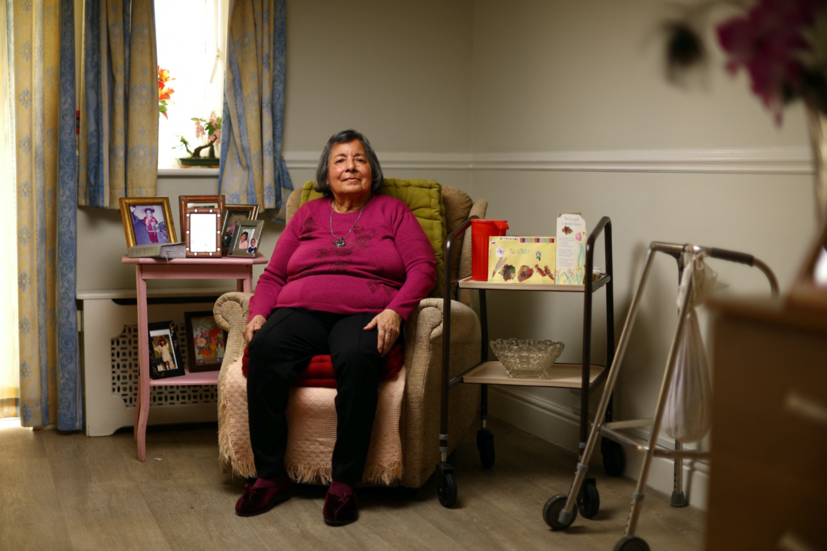 Eve Harewood, 83, poses for a photograph in her bedroom at the Peartree Care Home in London, Britain, on 11th April, 2023. 