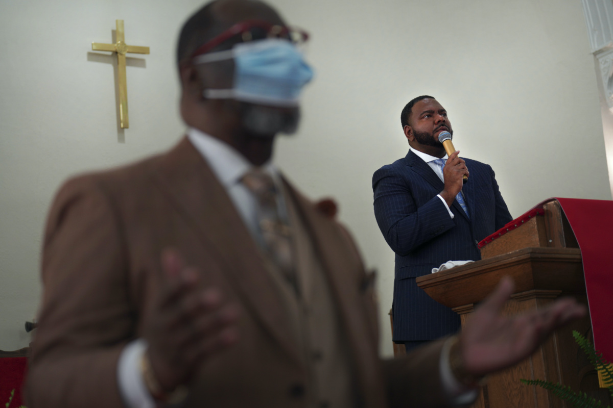 Rev M Andrew Davis, right, leads worship service at Zion Baptist Church on Sunday, 16th April, 2023, in Columbia, South Carolina