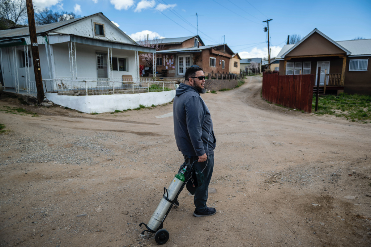 Angelo Sandoval, 'mayordormo' or caretaker of the 1830s San Antonio Church, stands on a dirt road in Cordova, New Mexico, Friday, on 14th April, 2023. 