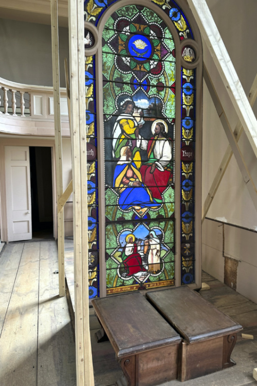 A nearly 150-year-old stained-glass window is displayed Monday, on 1st May, 2023 inside the now-closed St Mark's Episcopal church, in Warren, Rhode Island