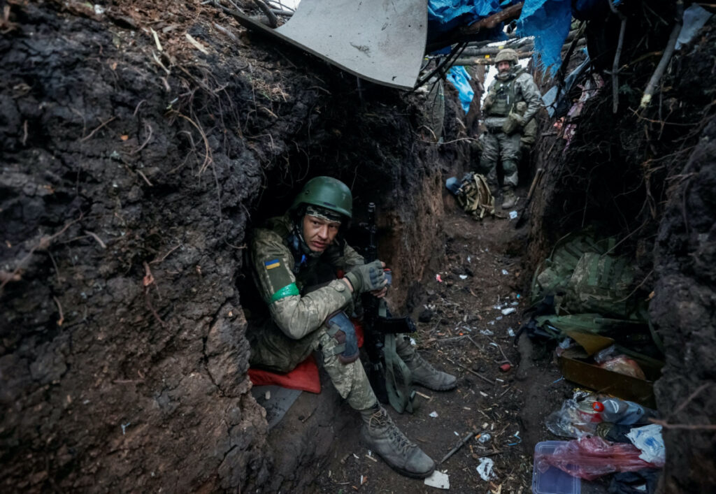 Ukrainian servicemen rest at their positions after a fight, as Russia's attack on Ukraine continues, near the front line city of Bakhmut, in Donetsk region, Ukraine, on 11th May, 2023.