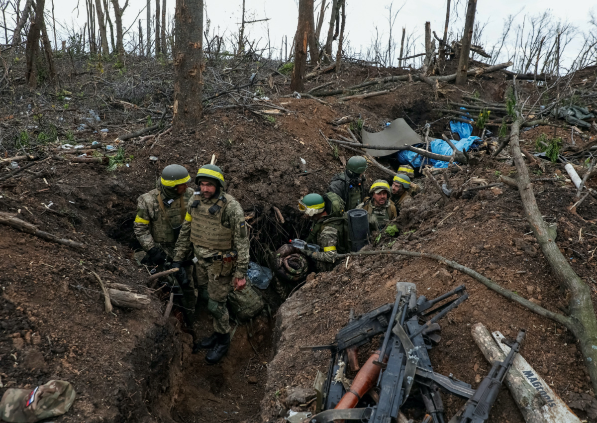 Ukrainian servicemen look on after a fight, as Russia's attack on Ukraine continues, near the front line city of Bakhmut, in Donetsk region, Ukraine on 11th May, 2023. 