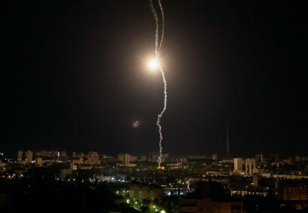 Explosion of a missile is seen in the sky over the city during a Russian missile strike, amid Russia's attack on Ukraine, in Kyiv, Ukraine, on 16th May, 2023