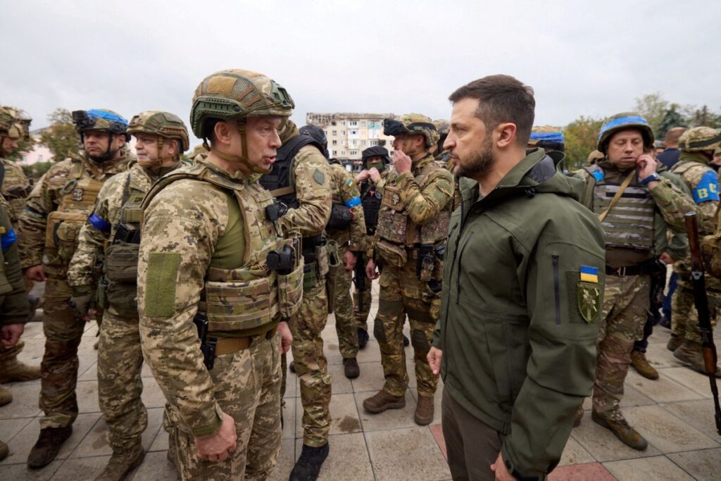 Ukraine's President Volodymyr Zelenskiy speaks with Colonel-General Oleksandr Syrskyi, Commander of the Ground Forces, in the town of Izium, on 14th September, 2022.