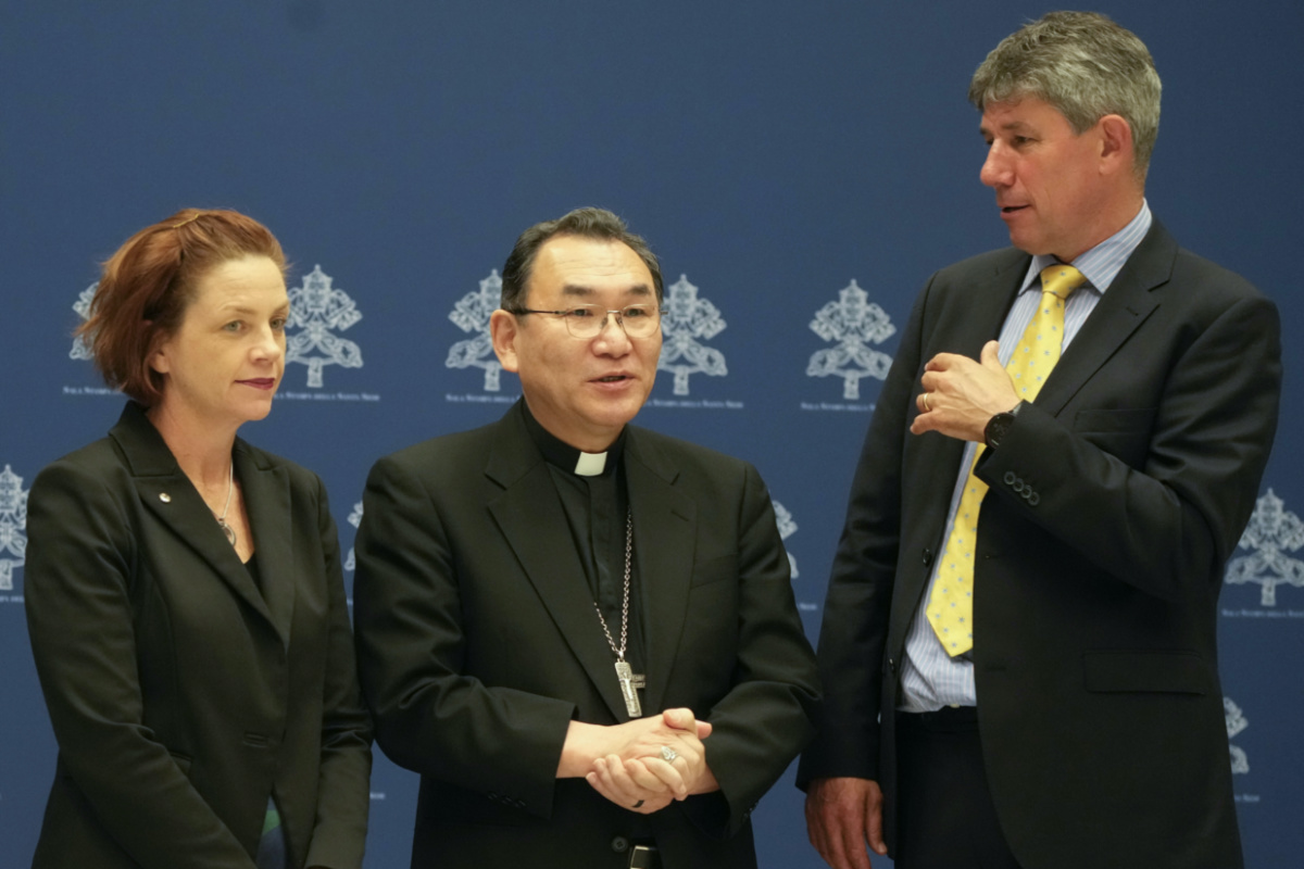 From left, Caritas Internationalis Vice President, Kirsty Robertson, Caritas Internationalis President, Tokyo Archbishop Tarcisio Isao Kikuchi and Caritas Internationalis secretary general Alistair Dutton meet the journalists at the Vatican, on Tuesday, 16th May, 2023. 