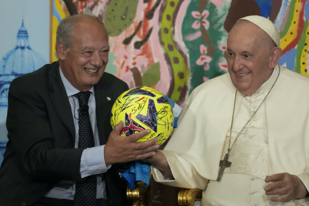 Pope Francis, flanked by Jose Maria del Corral, president of Scholas Occurrentes,