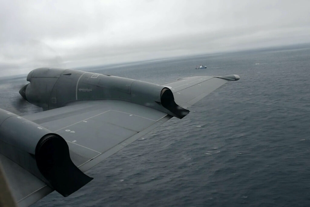 A Royal Canadian Air Force CP-140 Aurora maritime surveillance aircraft of 14 Wing flies a search pattern for the missing OceanGate submersible, over the Atlantic Ocean off Newfoundland, Canada, on 20th June, 2023 in a still image from video.