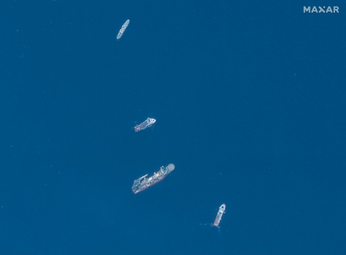 A satellite image shows ships taking part in the search and rescue operations associated with the missing Titan submersible near the wreck of the Titanic,  on 22nd June, 2023.