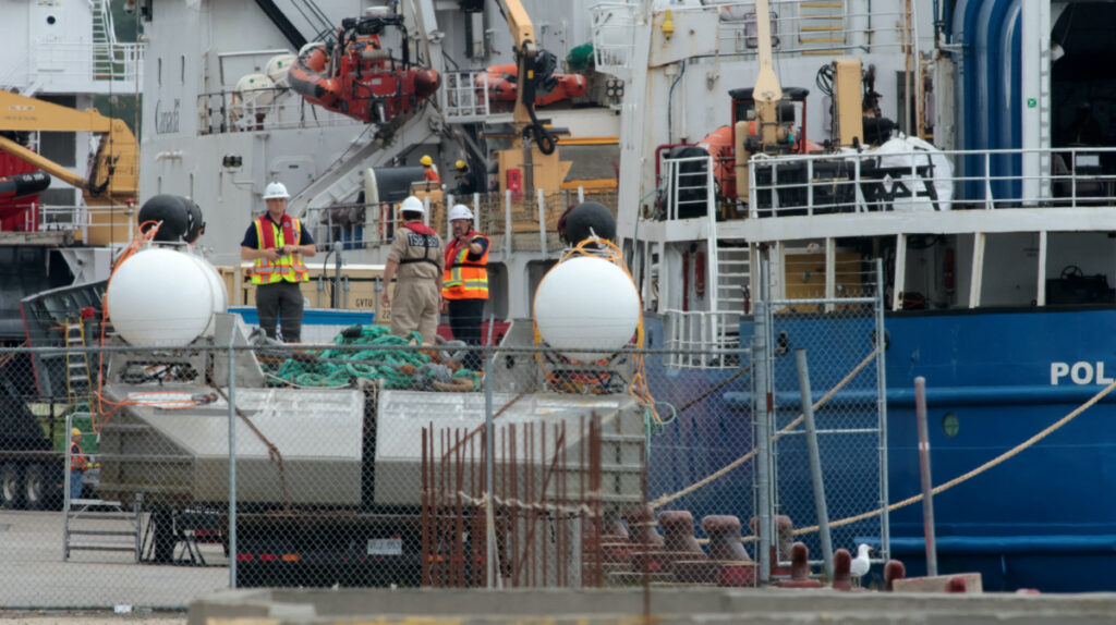 People inspect Polar Prince ship and the deployment barge used with the Titan submersible, St John's harbour, Newfoundland, Canada, on 25th June, 2023.