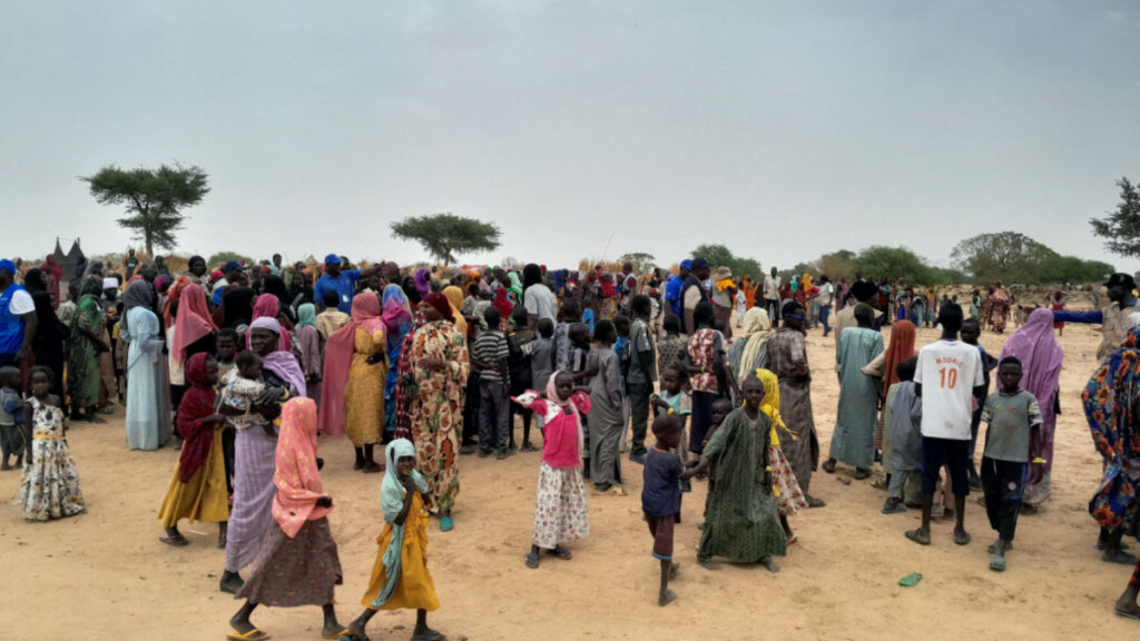 Sudanese people, who fled the violence in their country and newly arrived, wait to be registered at the camp near the border between Sudan and Chad in Adre, Chad, on 26th April, 2023.
