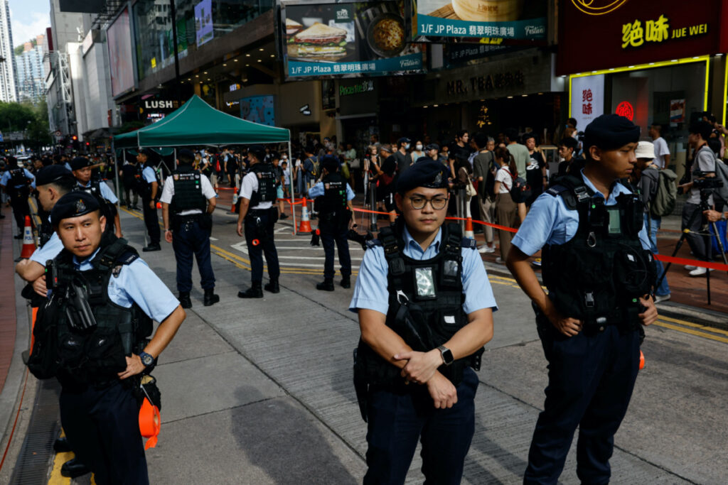 Police stand by in downtown on the 34th anniversary of the 1989 Beijing's Tiananmen Square crackdown, near where the candlelight vigil is usually held, in Hong Kong, China, on 4th June, 2023.