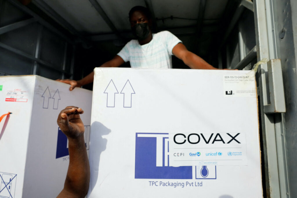 Boxes of AstraZeneca/Oxford coronavirus vaccines, redeployed from the Democratic Republic of Congo, arrive at a cold storage facility in Accra, Ghana, on 7th May, 2021.