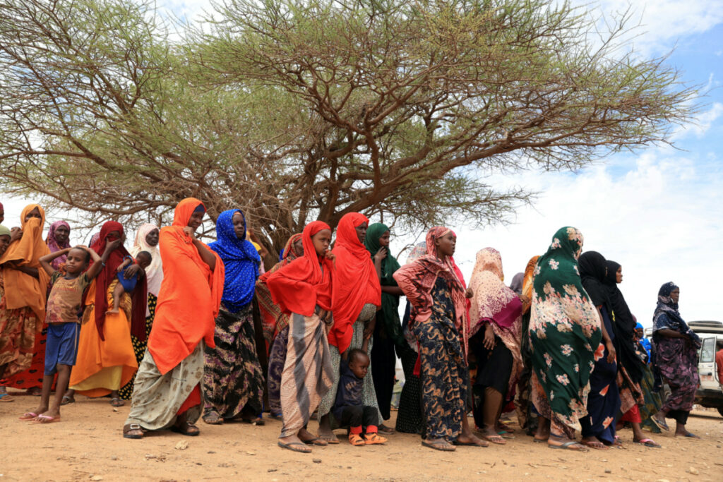 Internally displaced Ethiopians queue to receive food aid in the Higlo camp for people displaced by drought in the town of Gode, Somali Region, Ethiopia, on 26th April, 2022.