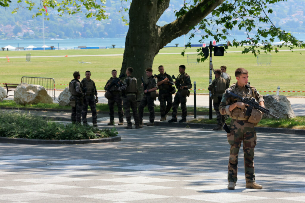 French soldiers secure the area after several children and an adult have been injured in a knife attack in Annecy, in the French Alps, France, on 8th June, 2023.
