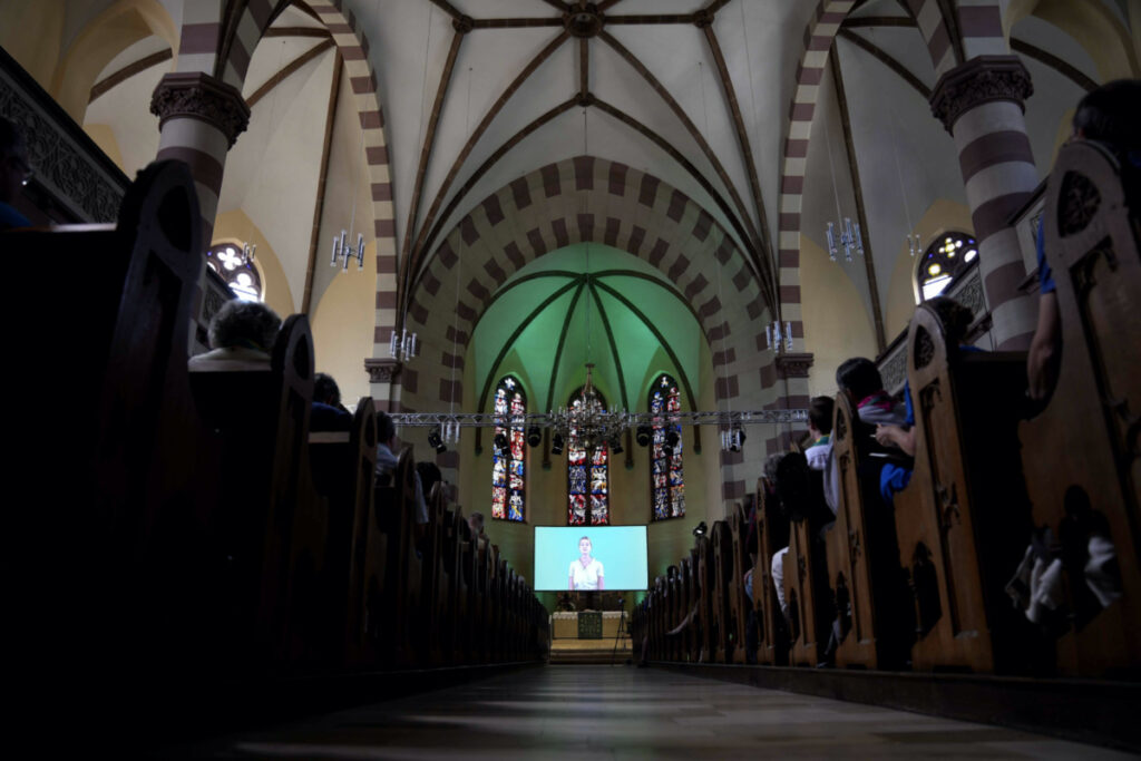 People attend a church service in Nuremberg, Germany, Friday, 9th June, 2023.