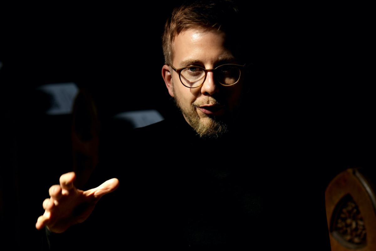 Jonas Simmerlein, theologian and philosopher from the University of Vienna in Austria, gestures during an interview with The Associated Press in Nuremberg, Germany, on Friday, 9th June, 2023. 