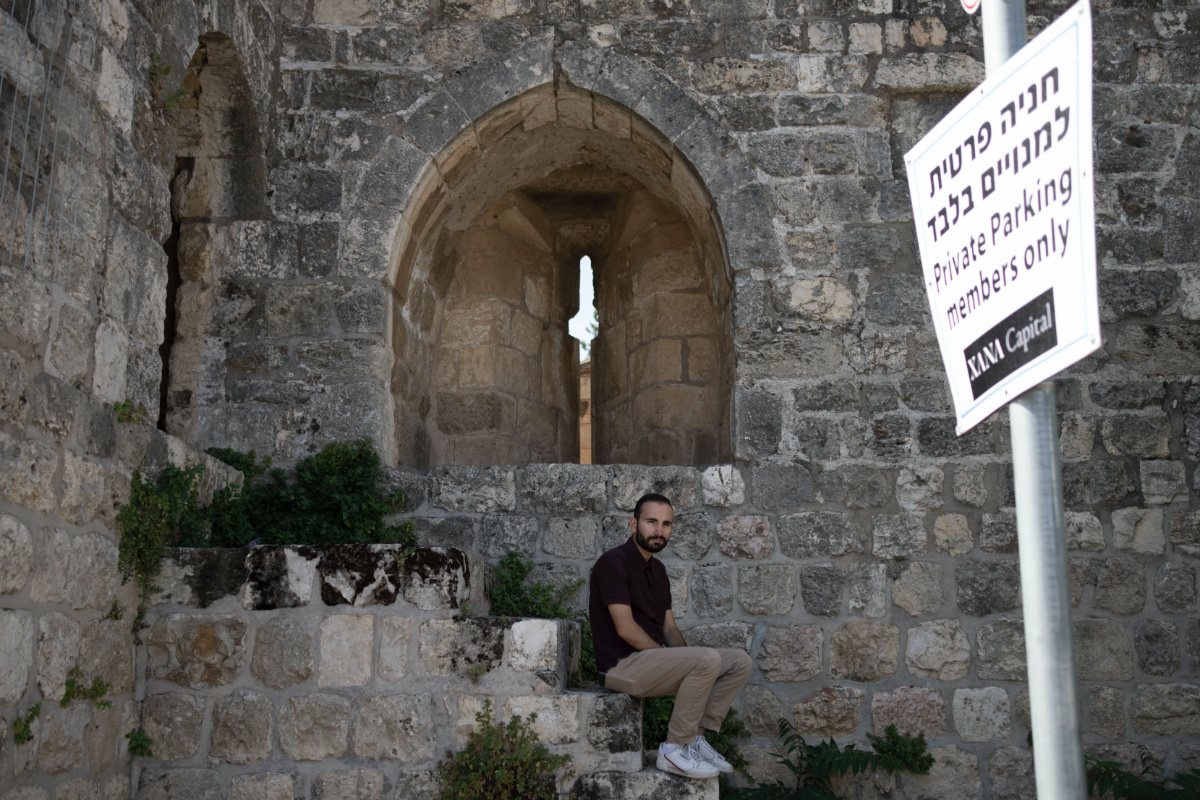 Community leader Hagop Djernazian poses for a portrait on the edge of a parking lot that is part of a contentious lease deal in the Armenian Quarter in the Old City of Jerusalem, on Tuesday, 30th May, 2023. 