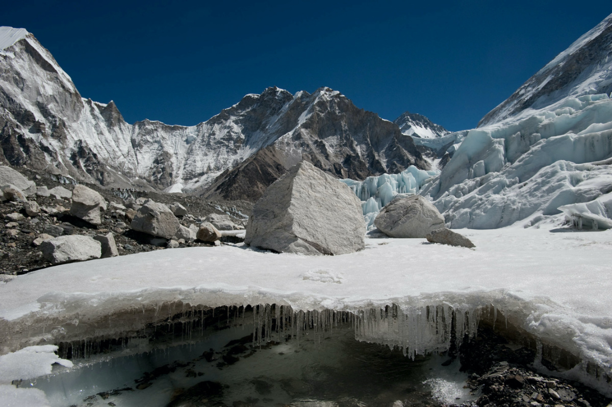 Water forms under Nepal's Khumbu glacier as the ice melts in this undated handout image. 