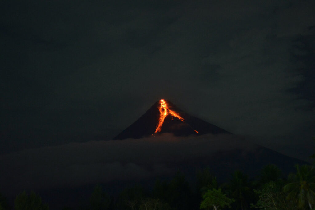 Lava flows from Mount Mayon volcano, in Daraga, Philippines, on 11th June, 2023, in this picture obtained from social media.