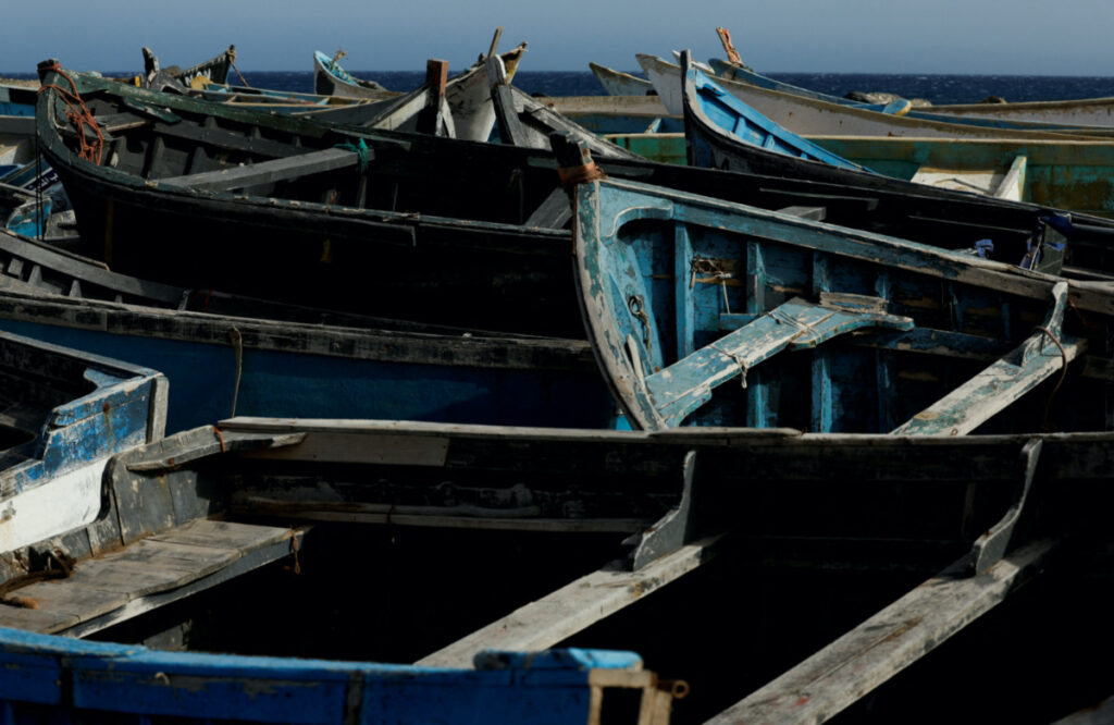 Dozens of wooden boats used by migrants to reach the Canary Islands are seen at the Port of Arinaga, in the island of Gran Canaria, Spain, on 7th June, 2022.
