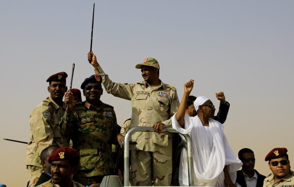 Lieutenant General Mohamed Hamdan Dagalo, deputy head of the military council and head of paramilitary Rapid Support Forces, greets his supporters as he arrives at a meeting in Aprag village, 60 kilometers away from Khartoum, Sudan, on 22nd June, 2019.