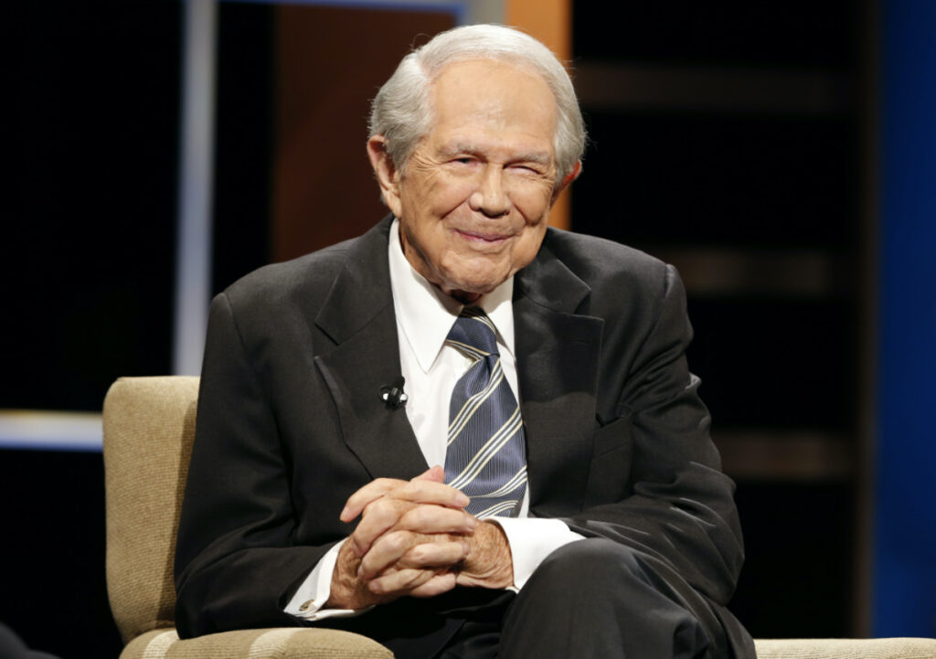 Rev Pat Robertson poses a question to a Republican presidential candidate during a forum at Regent University in Virginia Beach, Virginia, on 23rd October, 2015.