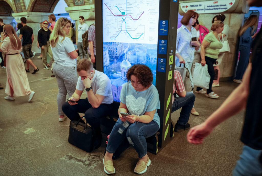 People take cover inside a subway station during an air raid alert, amid Russia's attack on Ukraine, in Kyiv, Ukraine, on 1st June, 2023.