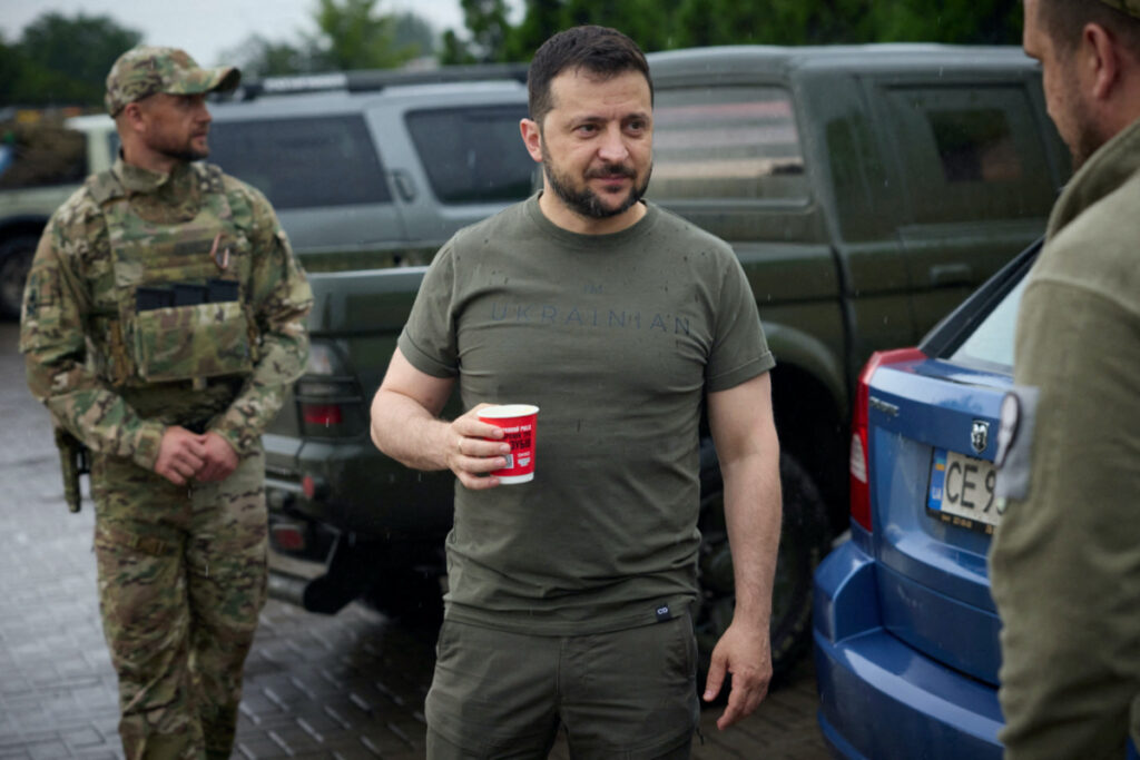 Ukraine's President Volodymyr Zelenskiy drinks coffee at a petrol station after visiting positions near the front line, amid Russia's attack on Ukraine, in Donetsk region, Ukraine, on 26th June 2023.