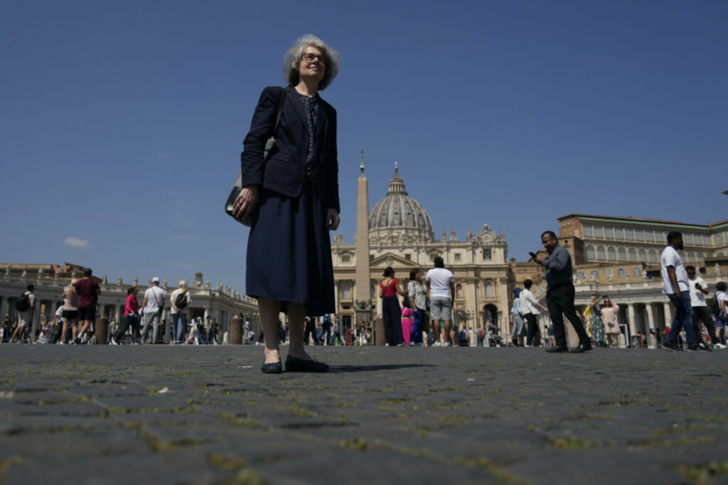 Sister Nathalie Becquart, the first female undersecretary in the Vatican's Synod of Bishops, poses for a photo in front of St Peter's Square, Monday, on 29th May, 2023.