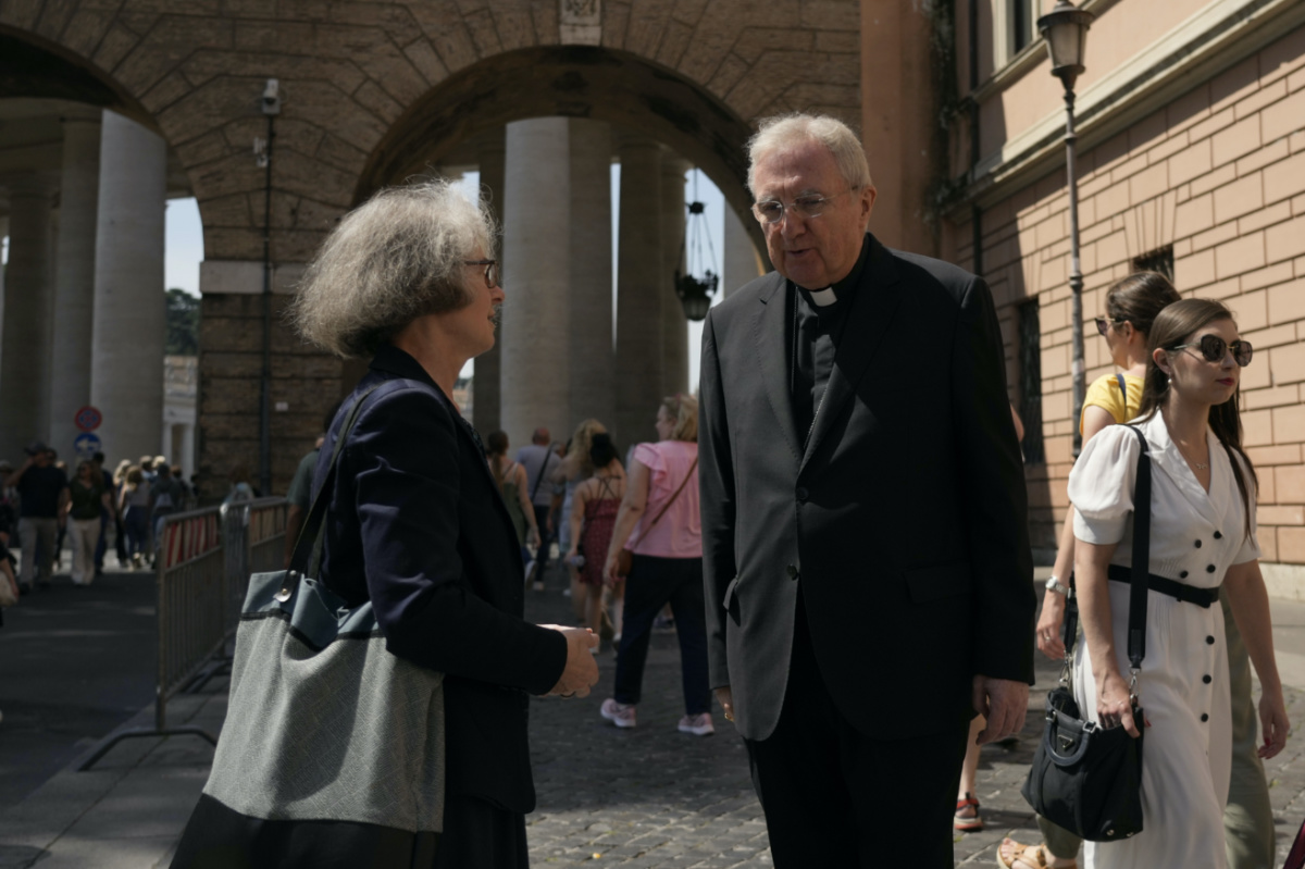 Sister Nathalie Becquart, the first female undersecretary in the Vatican's Synod of Bishops, shares a word with Cardinal Arthur Roche on her way to the Vatican, on Monday, 29th May, 2023. 