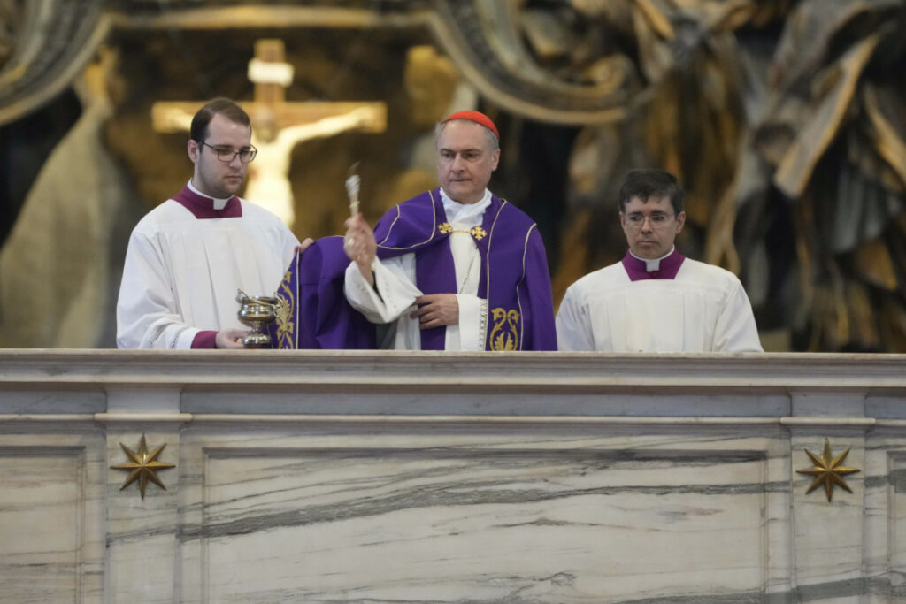 Cardinal Mauro Gambetti, center, blesses the altar of the confession during a penitential rite inside St Peter's Basilica, on Saturday, 3rd June, 2023