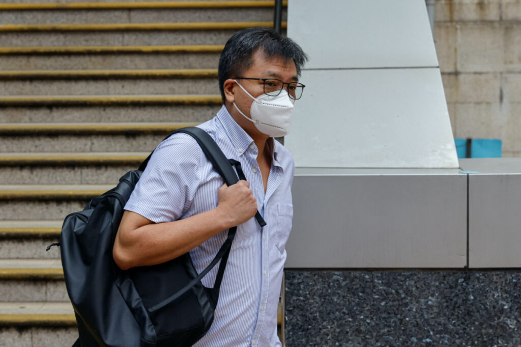Michael Wing C Kwok, elder brother of exiled activist Dennis Kwok Wing-hang, one of the eight overseas activists wanted by Hong Kong Police, leave from a police station, in Hong Kong, China, on 20th July, 2023.