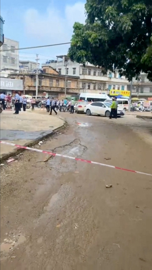 A police cordon is placed in the aftermath of a stabbing attack at a kindergarten in Lianjiang county, Guangdong province, China in this still image obtained from social media video released on 10th July, 2023.