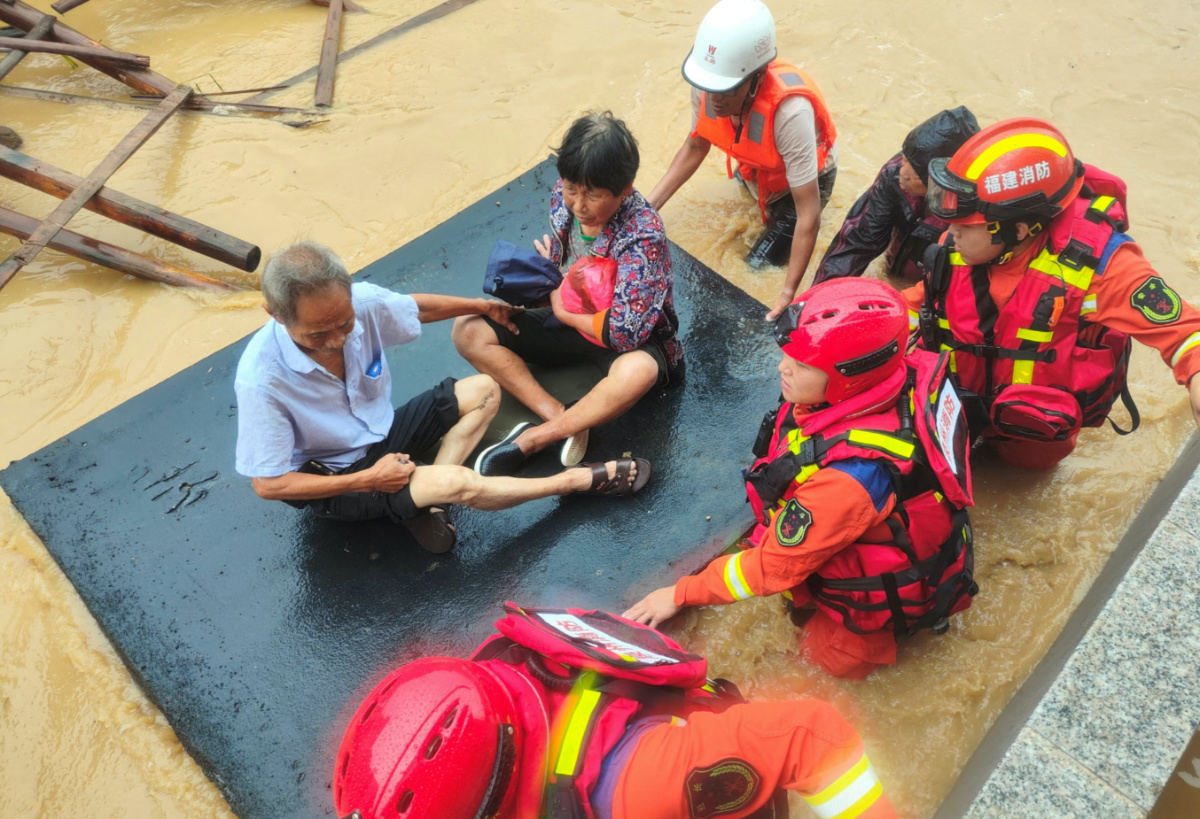 Firefighters evacuate residents stranded by floodwaters after Typhoon Doksuri made landfall in Quanzhou, Fujian province, China, on 28th July, 2023.