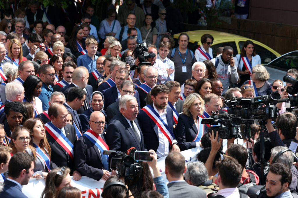 L'Hay-les-Roses mayor Vincent Jeanbrun, French Senate President Gerard Larcher, Ile-de-France Region President Valerie Pecresse, Member of parliament Eric Ciotti of the French conservative party Les Republicains (LR) attend a march with French politicians, elected officials and residents in support of L'Hay-les-Roses mayor, whose home was targeted by rioters, putting in danger his wife and two children, during unrests following the death of Nahel, a 17-year-old teenager killed by a French police officer in Nanterre during a traffic stop, in L'Hay-les-Roses near Paris, France, on 3rd July 2023.