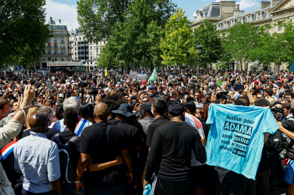 People attend a march in memory of Adama Traore, a 24-year-old Black Frenchman who died in a 2016 police operation, organised by his relatives, in a new context of mobilisations against police violence and inequality, following the death of Nahel, a 17-year-old teenager killed by a French police officer in Nanterre during a traffic stop, in Paris, France, on 8th July, 2023.