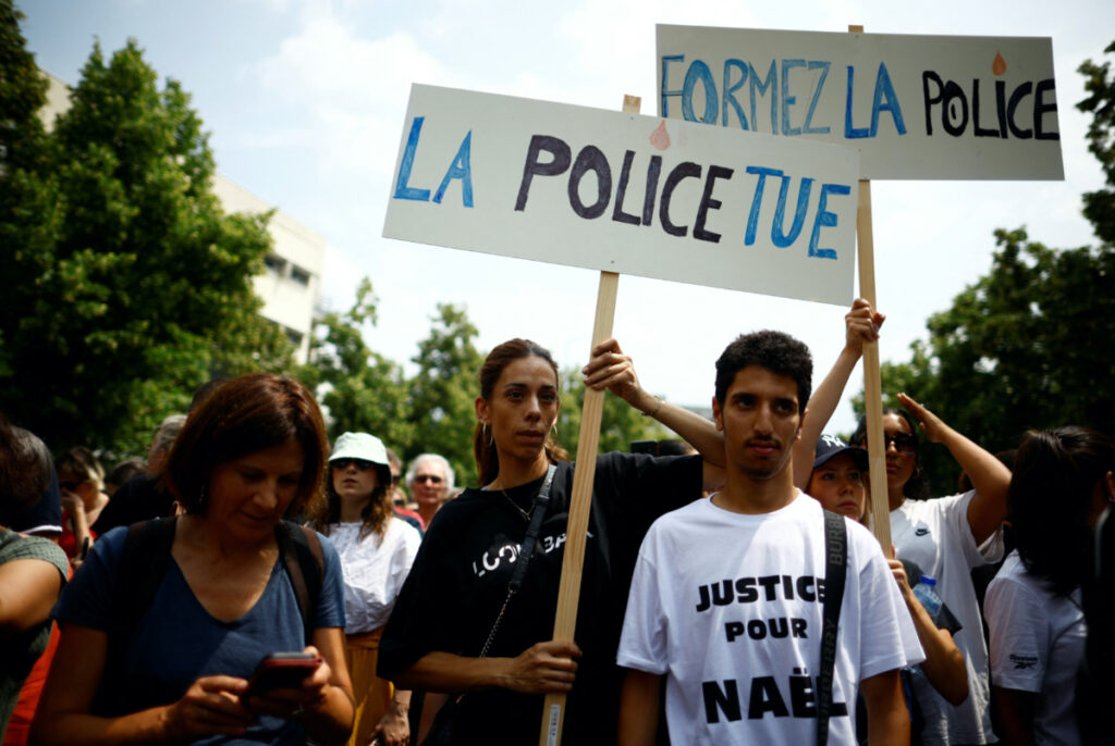People attend a march in tribute to Nahel, a 17-year-old teenager killed by a French police officer during a traffic stop, in Nanterre, Paris suburb, France, on 29th June, 2023.