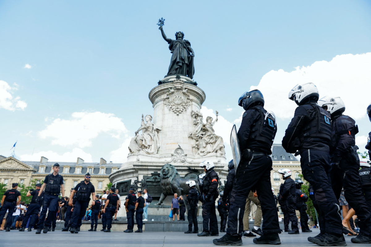 Members of the BRAV-M, the motorised violent action repression police brigades, stand guard at the Place de la Republique during a march in the memory of Adama Traore, a 24-year-old Black Frenchman who died in a 2016 police operation, organized by his relatives, in a new context of mobilisations against police violence and inequality,  following the death of Nahel, a 17-year-old teenager killed by a French police officer in Nanterre during a traffic stop, in Paris, France, on 8th July, 2023.