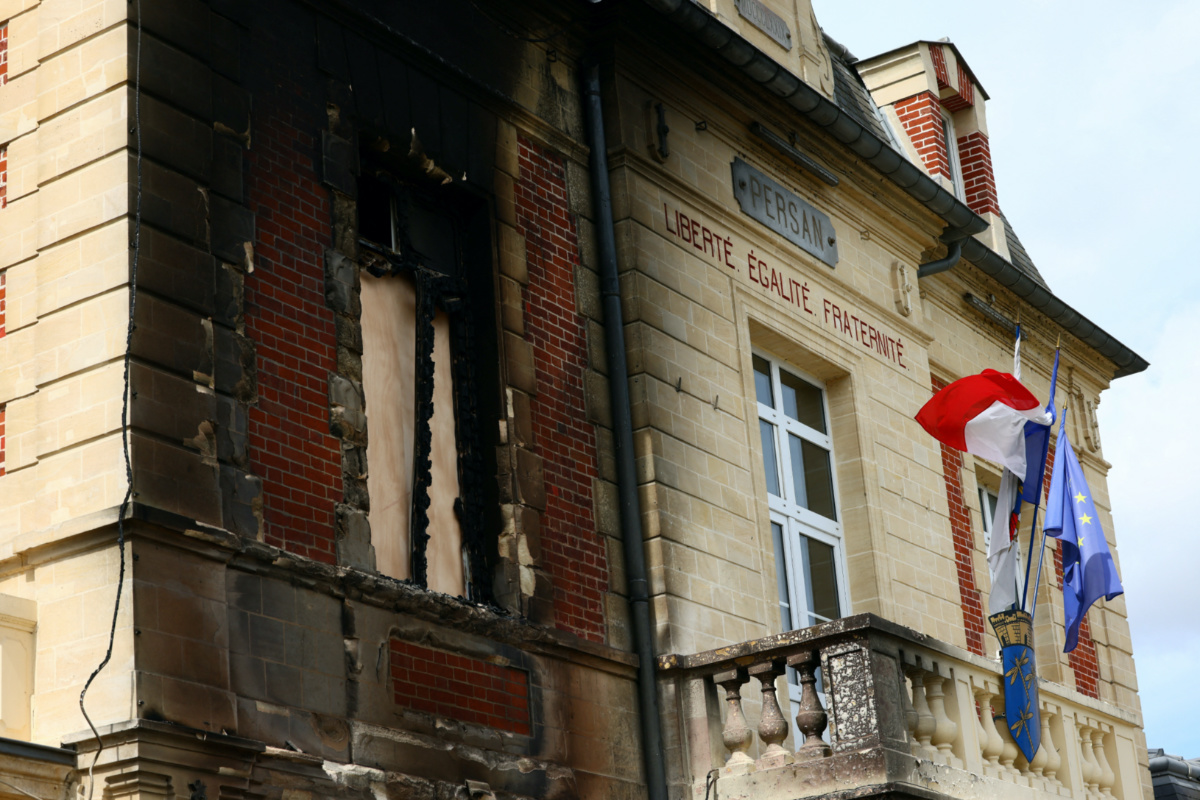 View of the town hall of Persan, which was partially burnt during night clashes, before a gathering in support of elected officials, following the death of Nahel, a 17-year-old teenager killed by a French police officer in Nanterre during a traffic stop, in Persan, near Paris, France, on 3rd July, 2023.