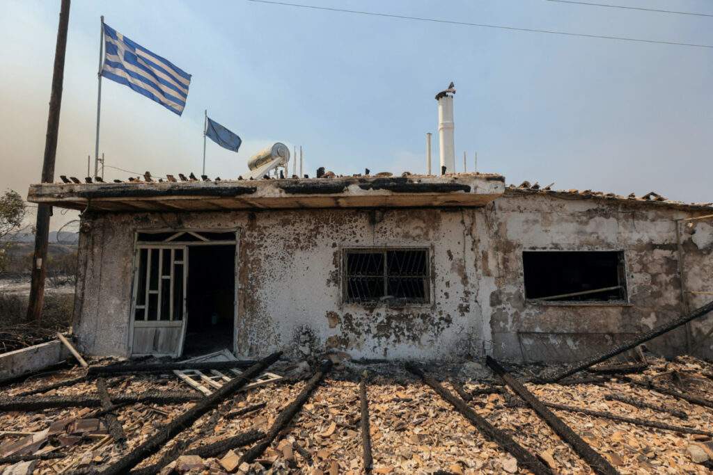 The destroyed restaurant of Dimitris Hajifotis is seen, as a wildfire burns on the island of Rhodes, Greece, on 26th July, 2023