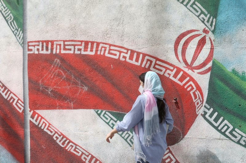 An Iranian woman walks in a street in Tehran, Iran, on 9th April, 2023.