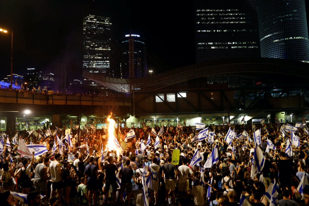 Protesters block Ayalon Highway during a demonstration following a parliament vote on a contested bill that limits Supreme Court powers to void some government decisions, in Tel Aviv, Israel, on 24th July, 2023.