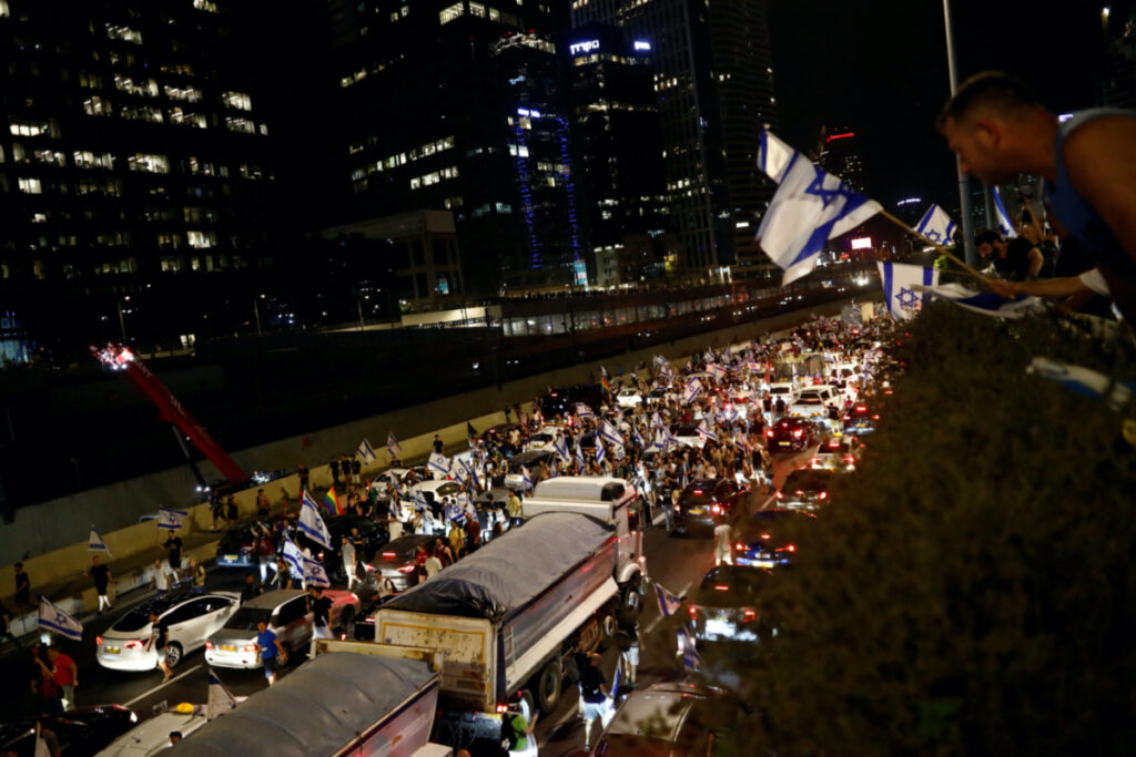 Protesters block part of Ayalon Highway during a demonstration following a parliament vote on a contested bill that limits Supreme Court powers to void some government decisions, in Tel Aviv, Israel, on 24th July, 2023.