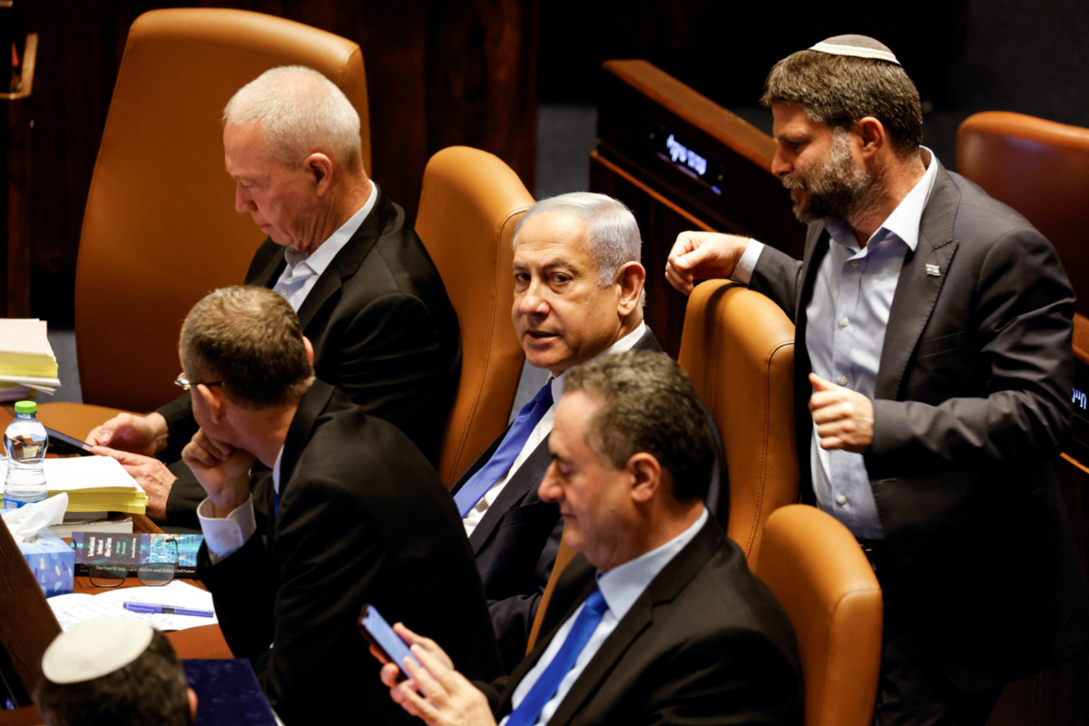 Israeli Prime Minister Benjamin Netanyahu and lawmakers gather at the Knesset plenum to vote on a bill that would limit some Supreme Court power, in Jerusalem, on 24th July, 2023. 